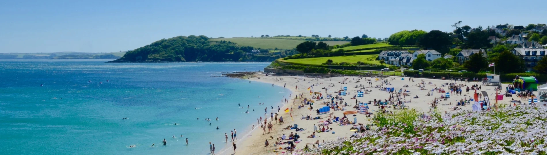 Busy Gyllyngvase beach, Cornwall, UK