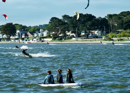 Three girls on a paddleboard